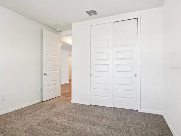 an empty room with closet