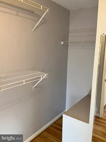 a view of a room with racks on the wall