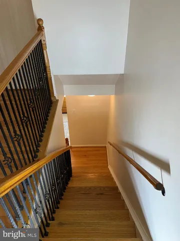 a view of balcony with wooden floor