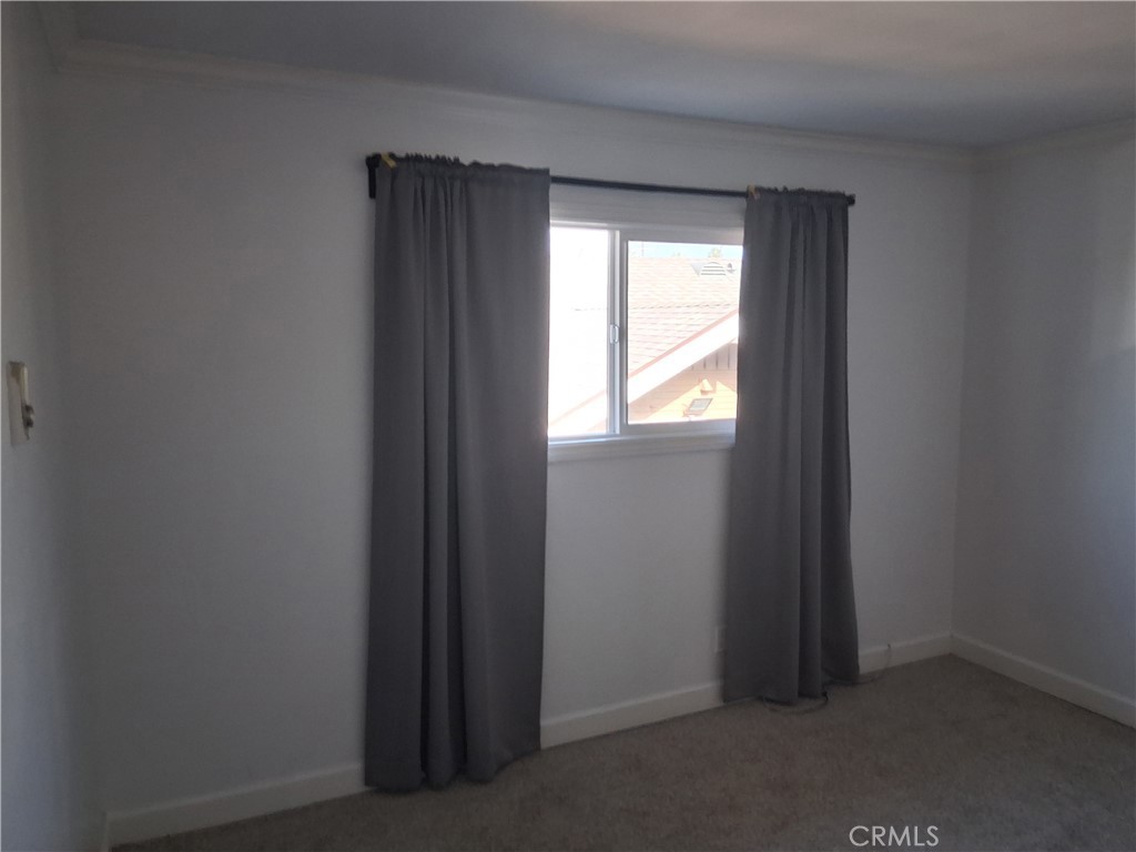 1040 Cedar Avenue, Unit 6 Long Beach, CA 90813 - Photo 12 of 17 a view of an empty room and a window