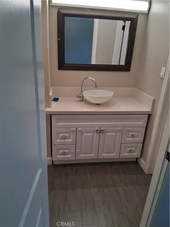 a bathroom with a bathtub and a window
