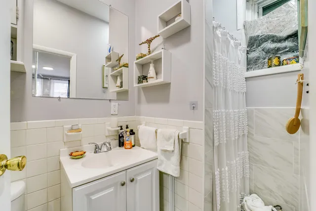 a utility room with a sink dryer and washer