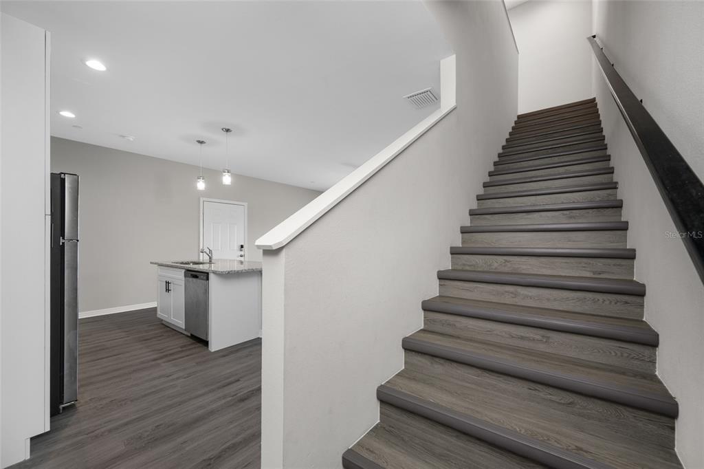 2115 Sebring Place Clearwater, FL 33760 - Photo 21 of 59 a view of entryway and hall with wooden floor