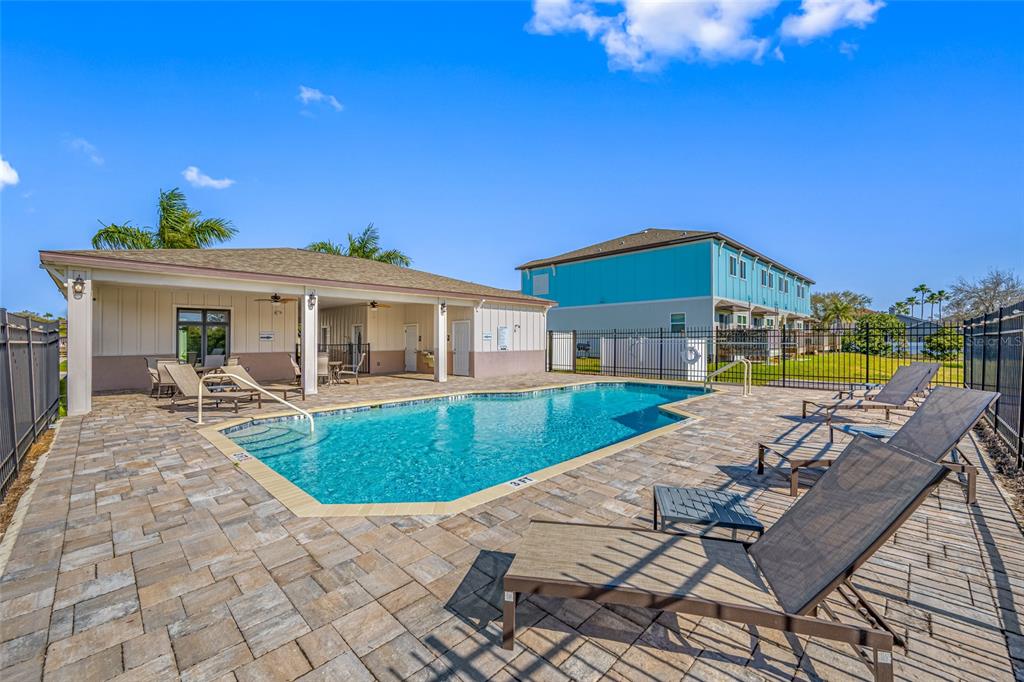 2115 Sebring Place Clearwater, FL 33760 - Photo 49 of 59 a view of a house with swimming pool and sitting area