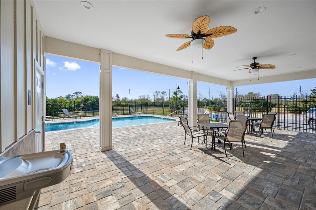 2115 Sebring Place Clearwater, FL 33760 - Photo 54 of 59 a view of a patio with a table chairs and a patio