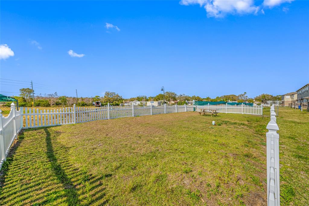 2115 Sebring Place Clearwater, FL 33760 - Photo 58 of 59 a view of a lake with houses