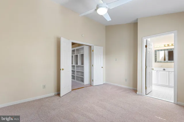 an empty room with a bathroom