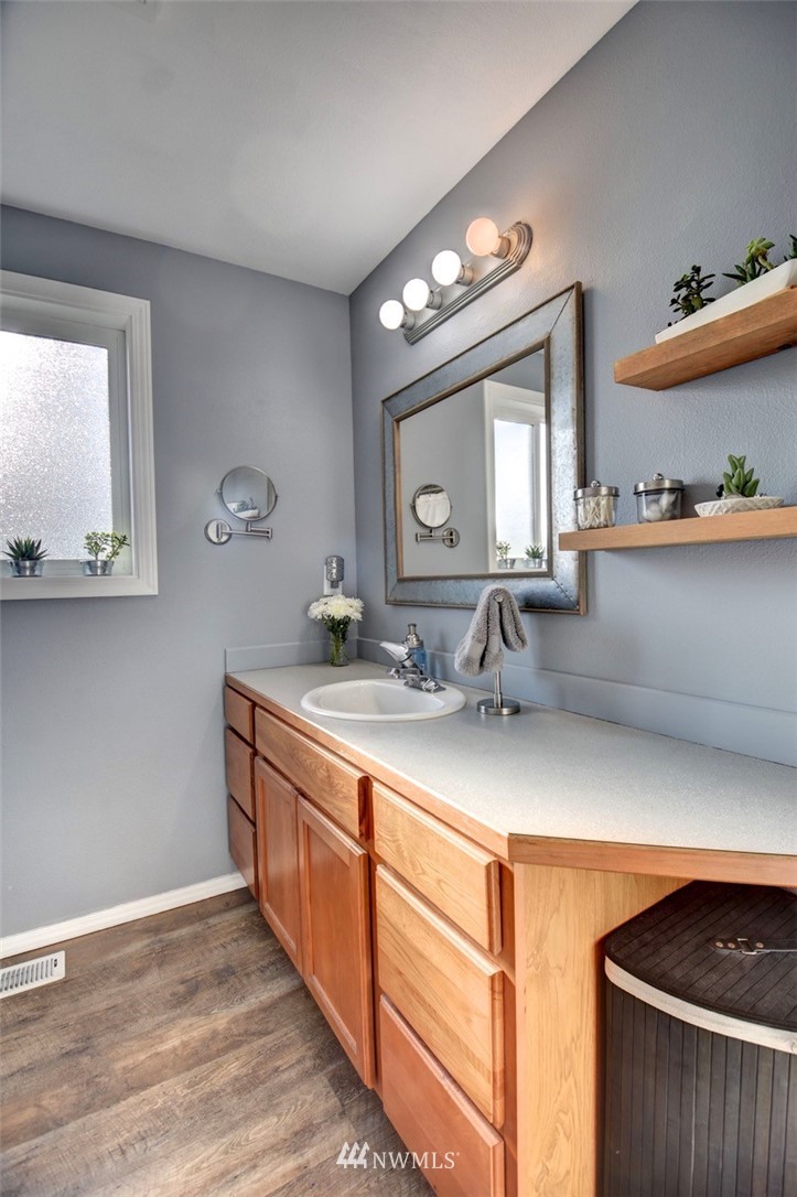 5124 183rd Lane Southwest Rochester, WA 98579 - Photo 13 of 31 a bathroom with a sink and a mirror