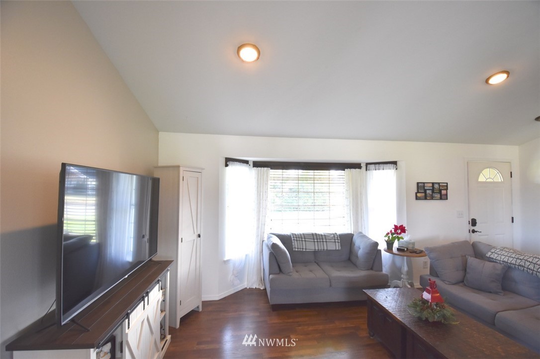 5124 183rd Lane Southwest Rochester, WA 98579 - Photo 20 of 31 a living room with furniture and a large window