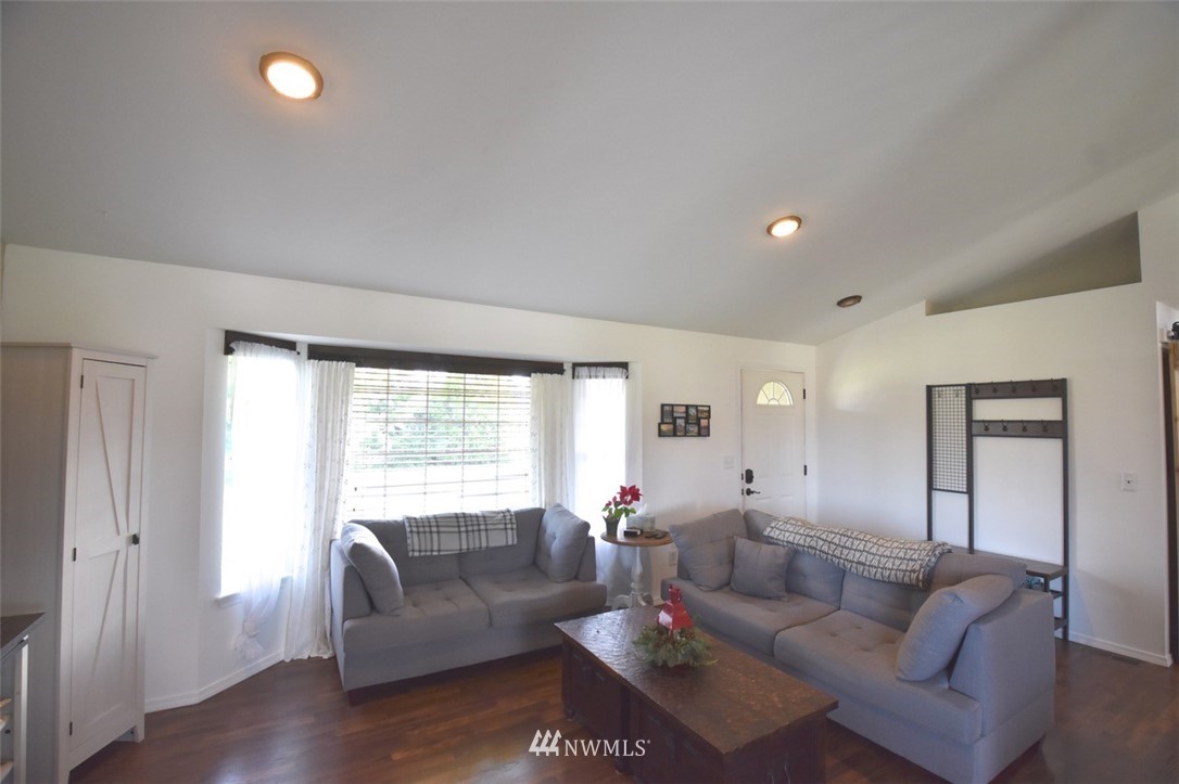 5124 183rd Lane Southwest Rochester, WA 98579 - Photo 21 of 31 a living room with furniture and a large window