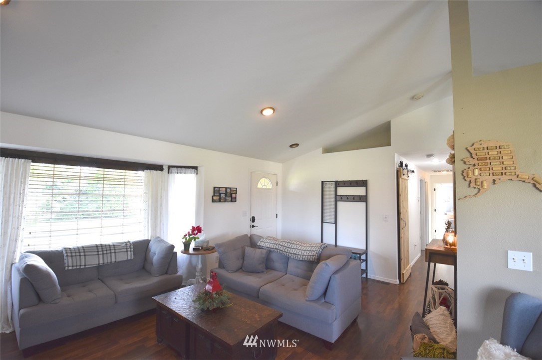 5124 183rd Lane Southwest Rochester, WA 98579 - Photo 22 of 31 a living room with furniture and a large window