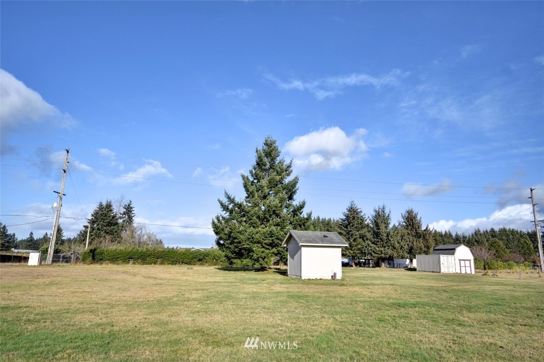 5124 183rd Lane Southwest Rochester, WA 98579 - Photo 26 of 31 a view of a lake with a big yard
