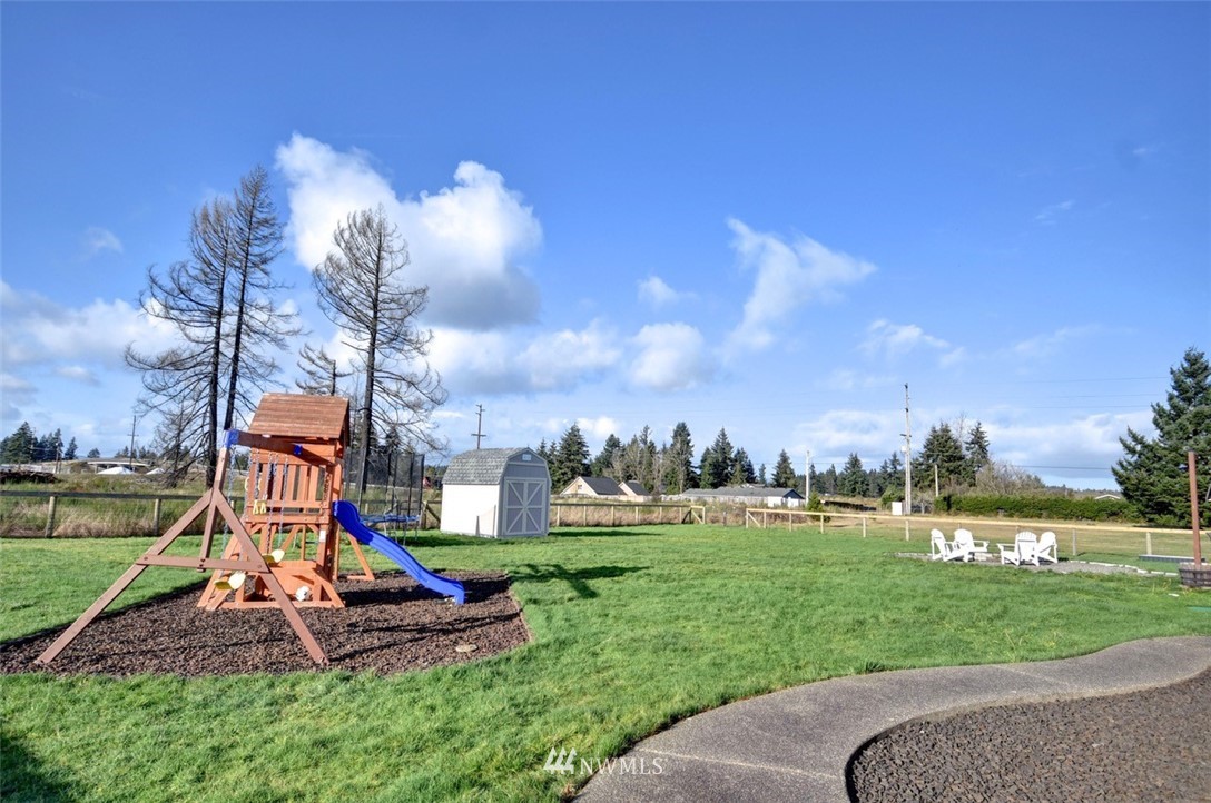 5124 183rd Lane Southwest Rochester, WA 98579 - Photo 27 of 31 a view of a park with swings and slides
