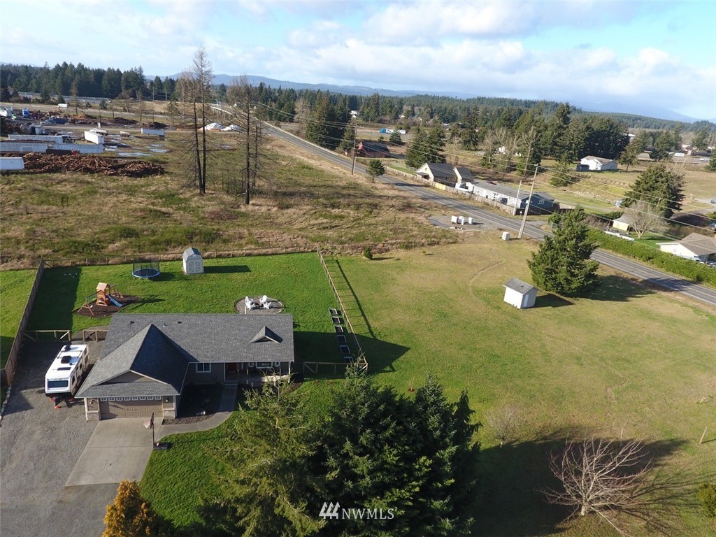 5124 183rd Lane Southwest Rochester, WA 98579 - Photo 29 of 31 a view of swimming pool with outdoor seating and city view