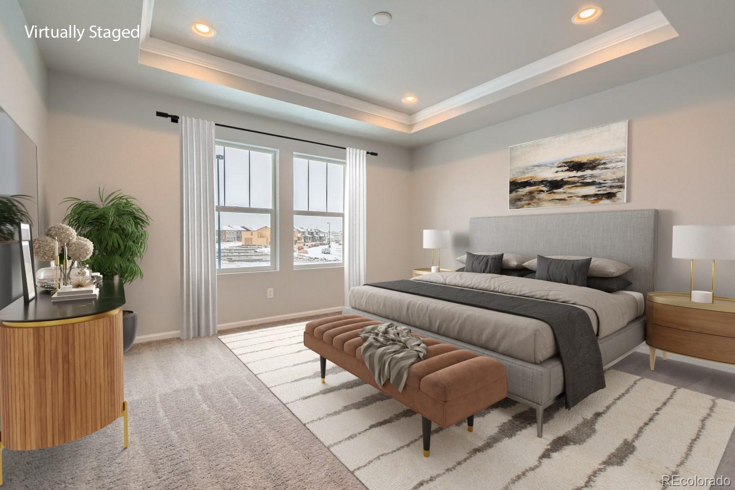 19032 High Point Boulevard Denver, CO 80249 - Photo 14 of 17 a spacious bedroom with a large bed and a couch