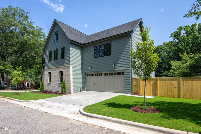 a view of an entryway with wooden floor and a bedroom