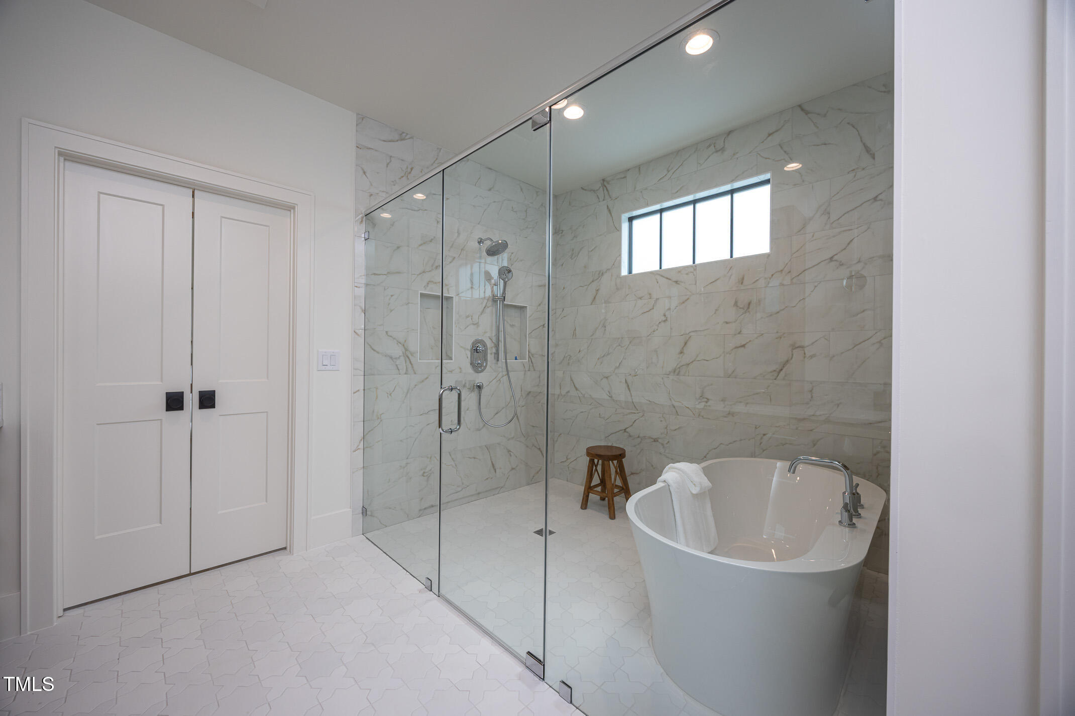 1000 Marilyn Drive Raleigh, NC 27607 - Photo 35 of 59 a bathroom with a bathtub and shower