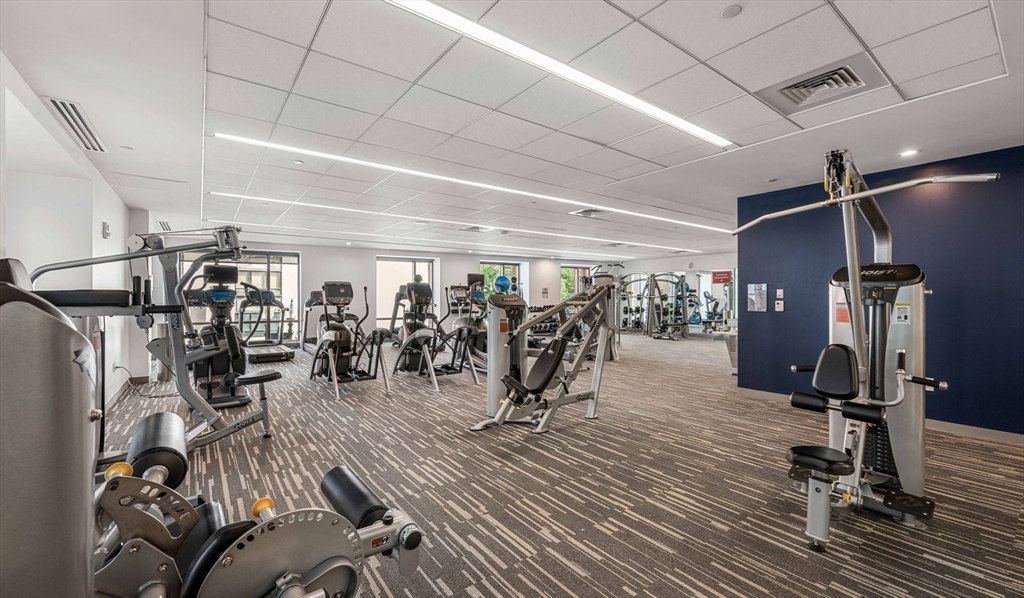 99 Kneeland Street, Unit 1908 Boston, MA 02111 - Photo 10 of 12 a view of a room with gym equipment