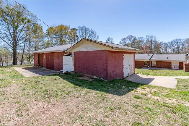 a view of a backyard of the house