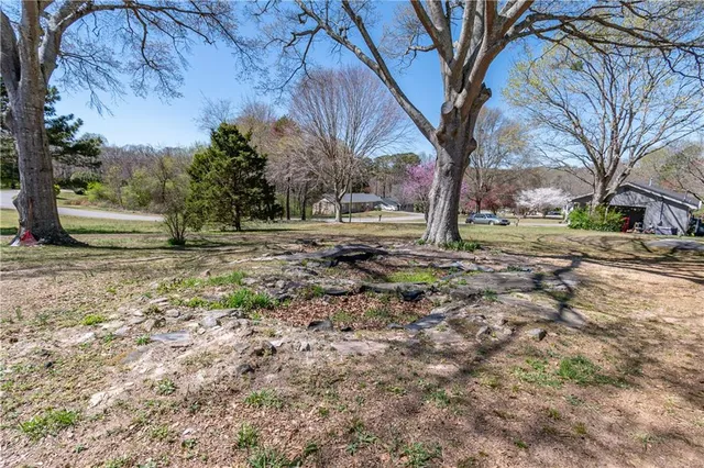 an aerial view of a house with swimming pool