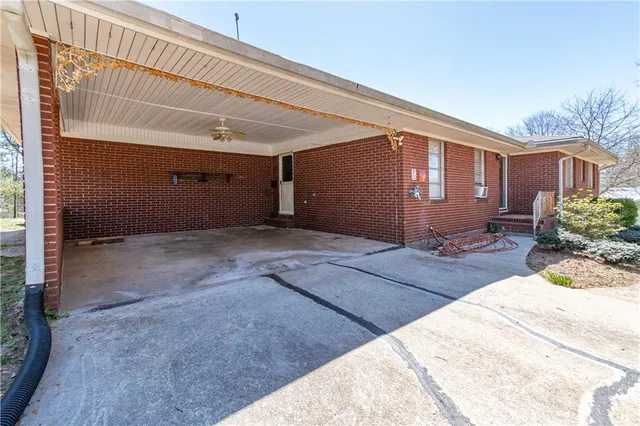 a view of a backyard of the house