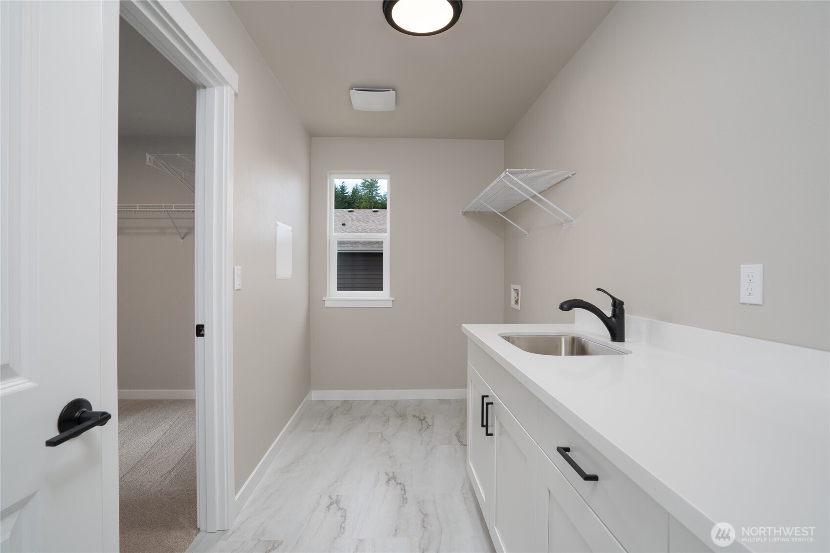 2452 Ridgeway Drive Oak Harbor, WA 98277 - Photo 6 of 10 a bathroom with a sink and mirror