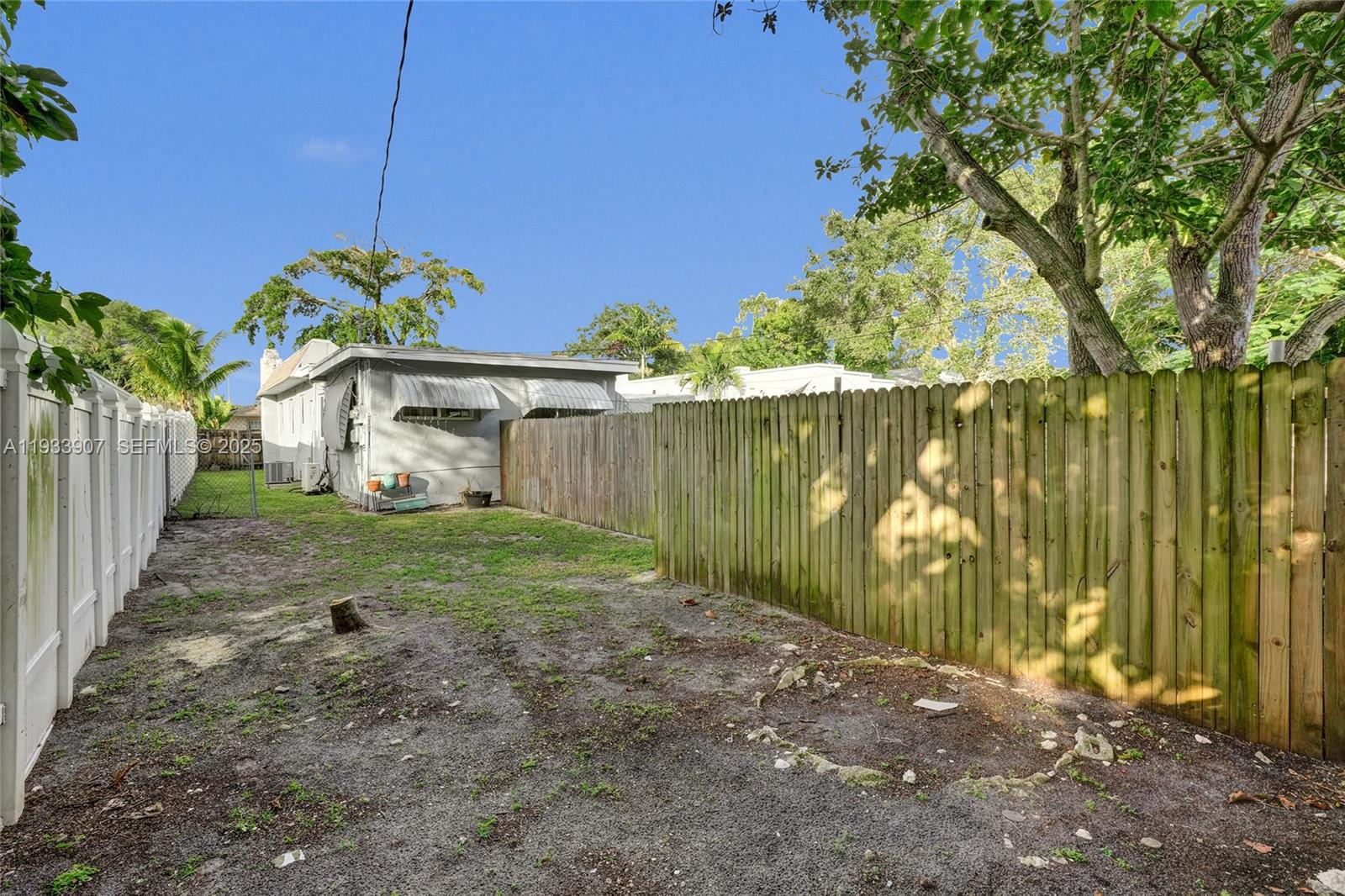 249 Southwest 4th Street, Unit 2 Dania Beach, FL 33004 - Photo 23 of 26 a house view with a garden space