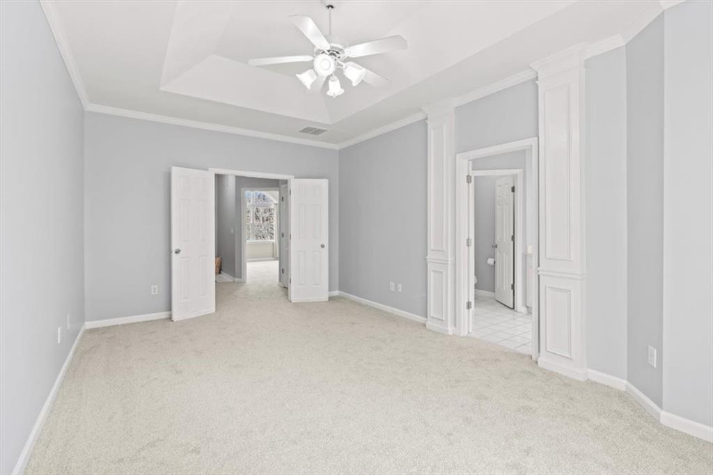 1200 Wing Street, Unit 8 Atlanta, GA 30350 - Photo 20 of 54 an empty room with fan and a ceiling fan