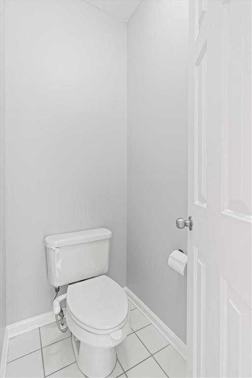 1200 Wing Street, Unit 8 Atlanta, GA 30350 - Photo 29 of 54 a white toilet sitting next to a shower