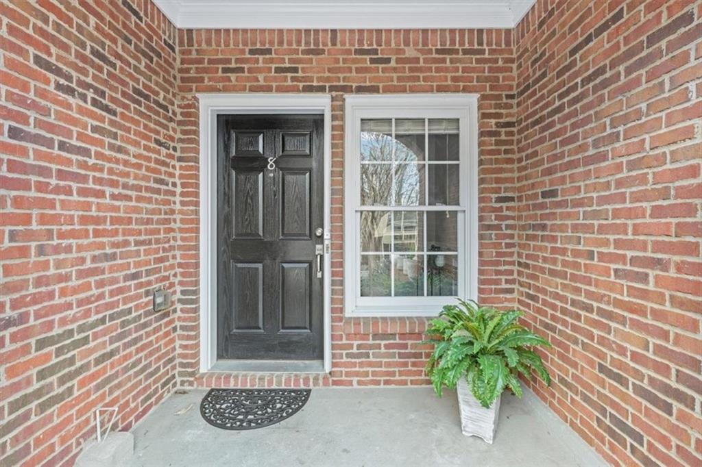 1200 Wing Street, Unit 8 Atlanta, GA 30350 - Photo 3 of 54 a view of a brick house with a large window