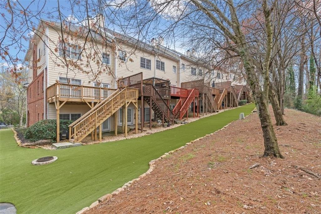 1200 Wing Street, Unit 8 Atlanta, GA 30350 - Photo 37 of 54 a view of a house with a yard