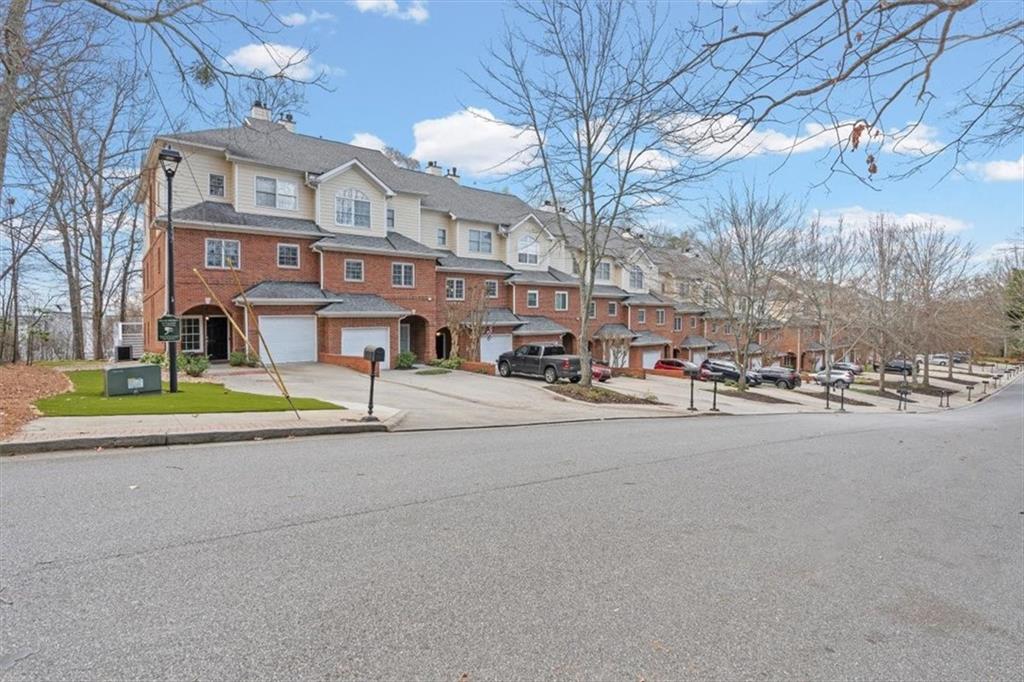 1200 Wing Street, Unit 8 Atlanta, GA 30350 - Photo 49 of 54 a view of a street with houses