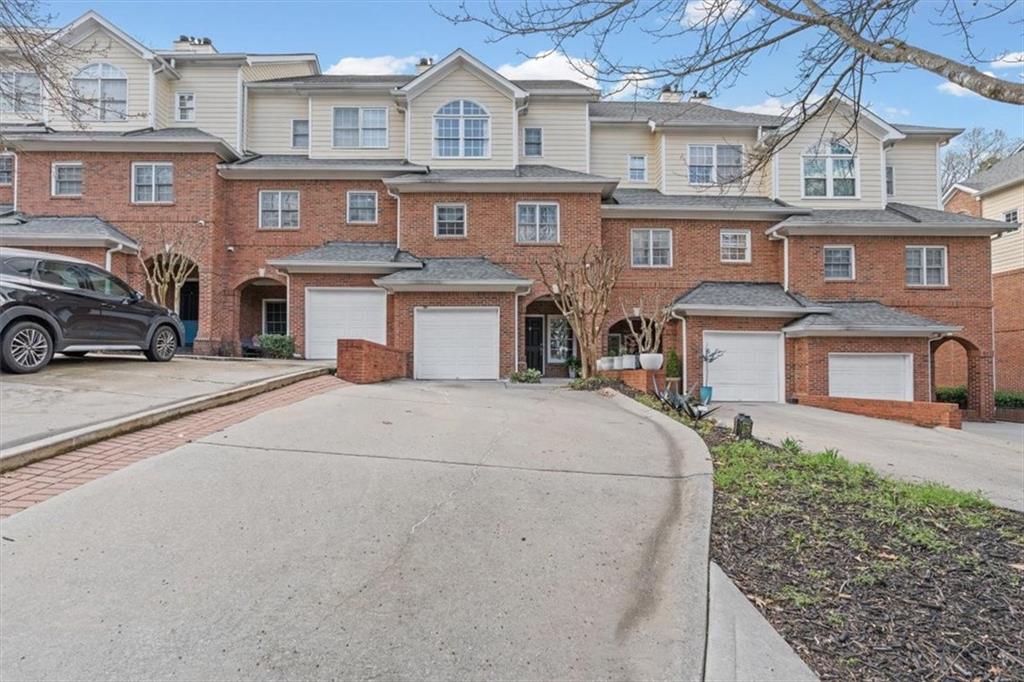 1200 Wing Street, Unit 8 Atlanta, GA 30350 - Photo 50 of 54 a front view of a house with a yard