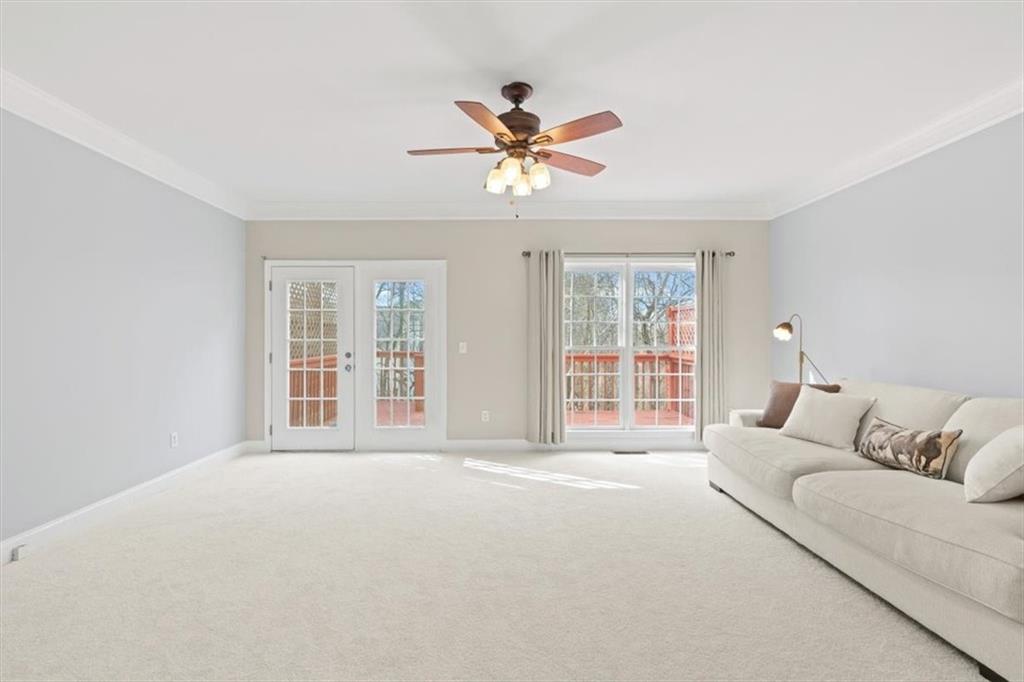 1200 Wing Street, Unit 8 Atlanta, GA 30350 - Photo 7 of 54 a living room with furniture and a large window