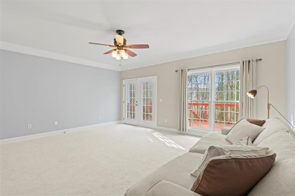 1200 Wing Street, Unit 8 Atlanta, GA 30350 - Photo 8 of 54 a living room with furniture and a window