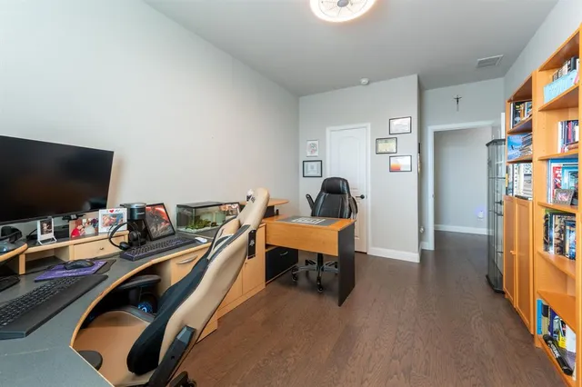 a room with furniture and a flat screen tv