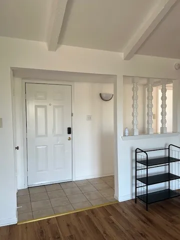 a view of livingroom with furniture and wooden floor