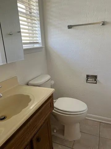 a bathroom with a sink and a toilet