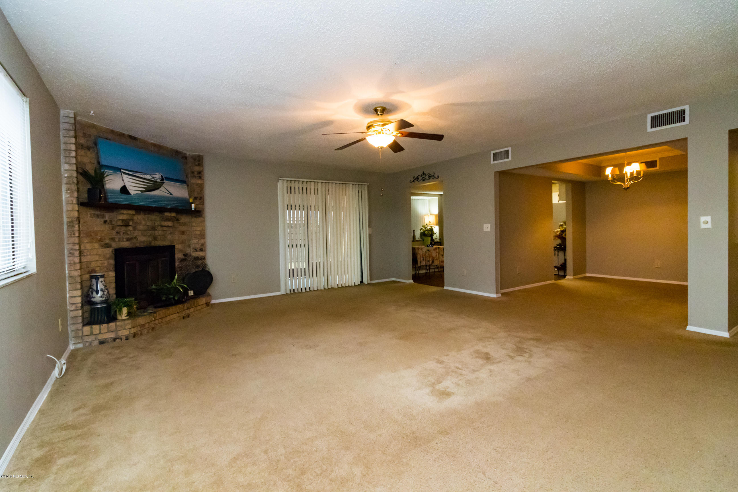 508 Penman Road Neptune Beach, FL 32266 - Photo 8 of 32 a view of an empty room with a fireplace