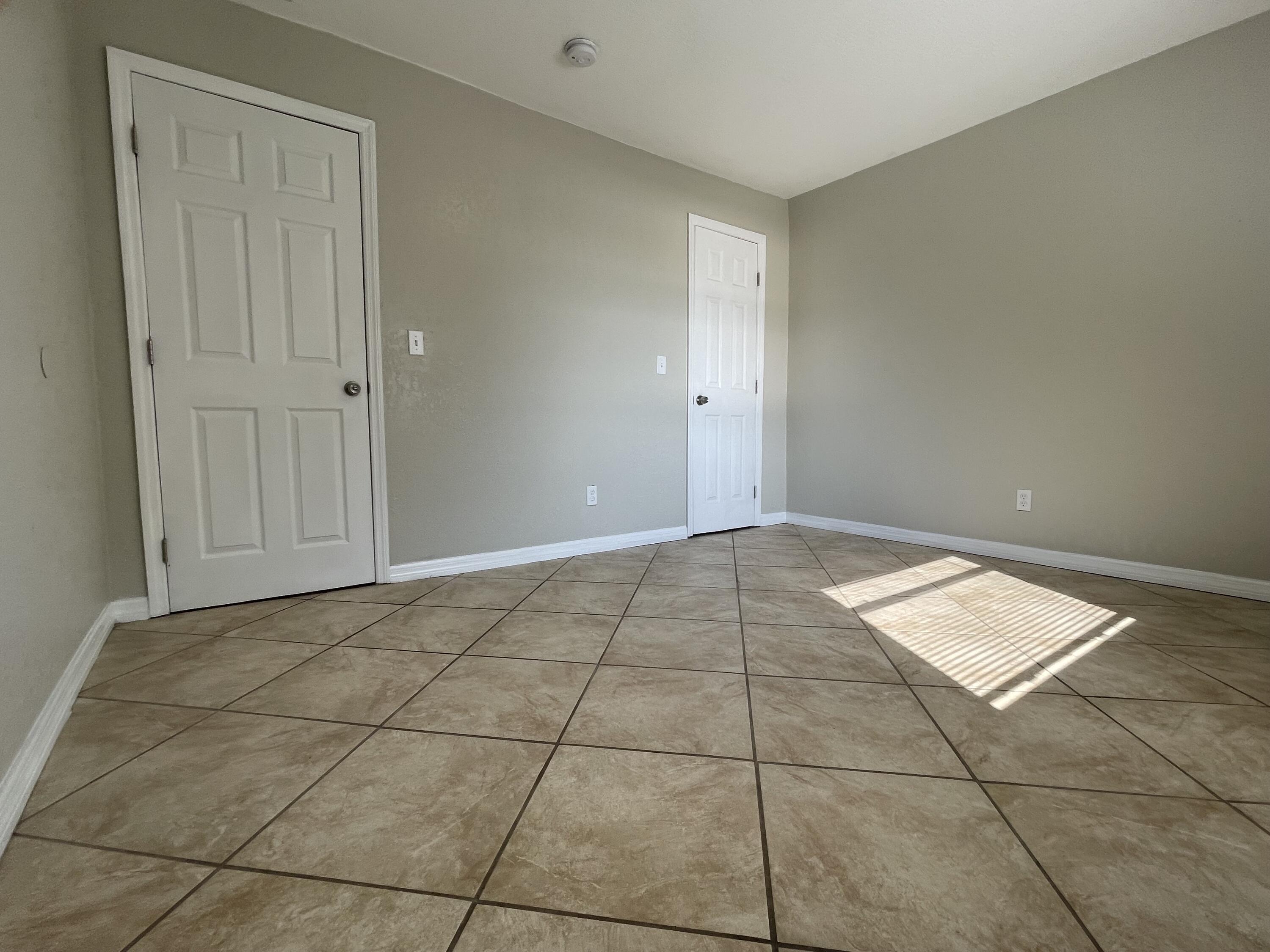 2880 Harson Way Fort Pierce, FL 34946 - Photo 22 of 40 a view of an empty room and window