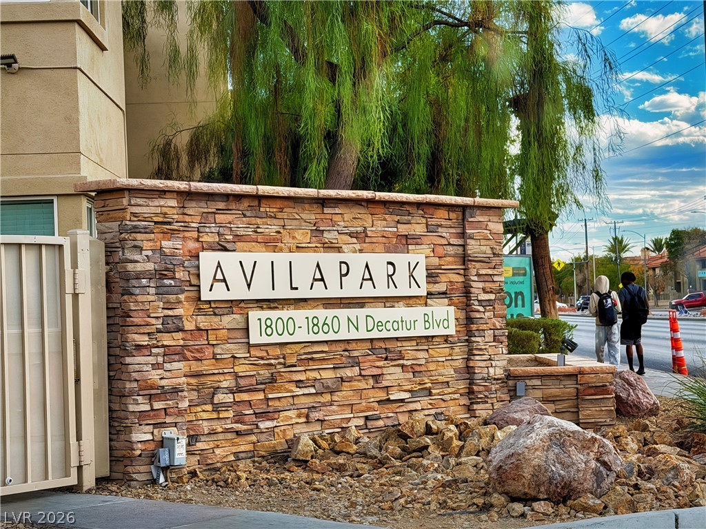1852 North Decatur Boulevard, Unit 101 Las Vegas, NV 89108 - Photo 12 of 45 An inviting stone-clad monument sign welcomes residents to the community.