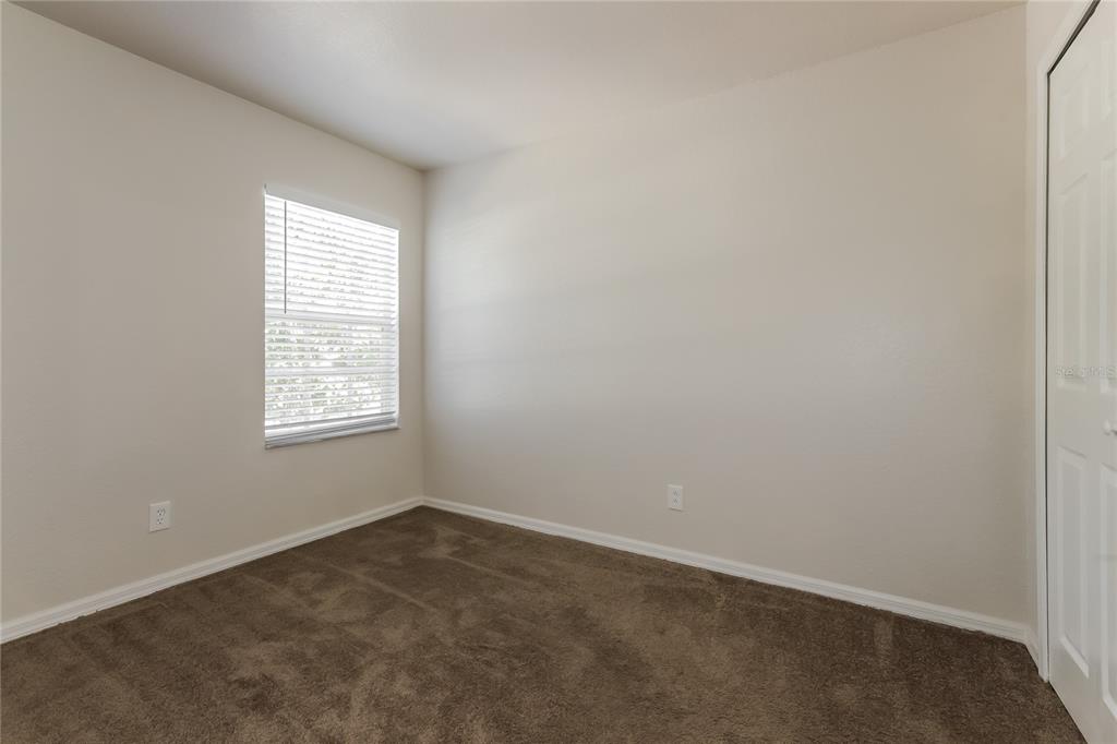 11420 Bay Gardens Loop Riverview, FL 33569 - Photo 12 of 17 an empty room with a window