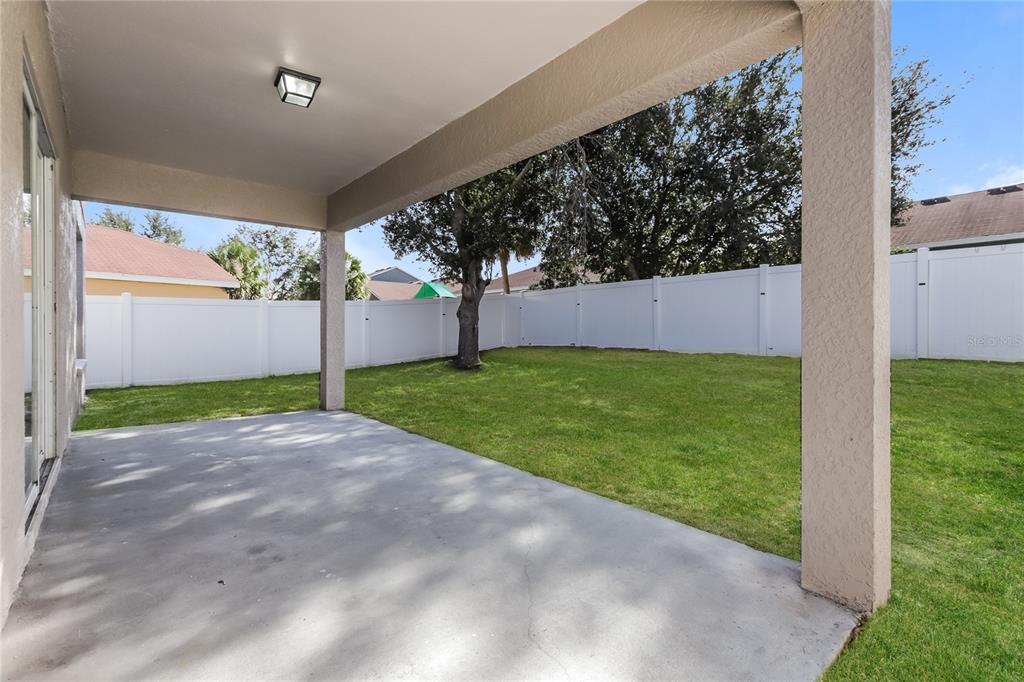11420 Bay Gardens Loop Riverview, FL 33569 - Photo 15 of 17 a view of a yard with potted plants