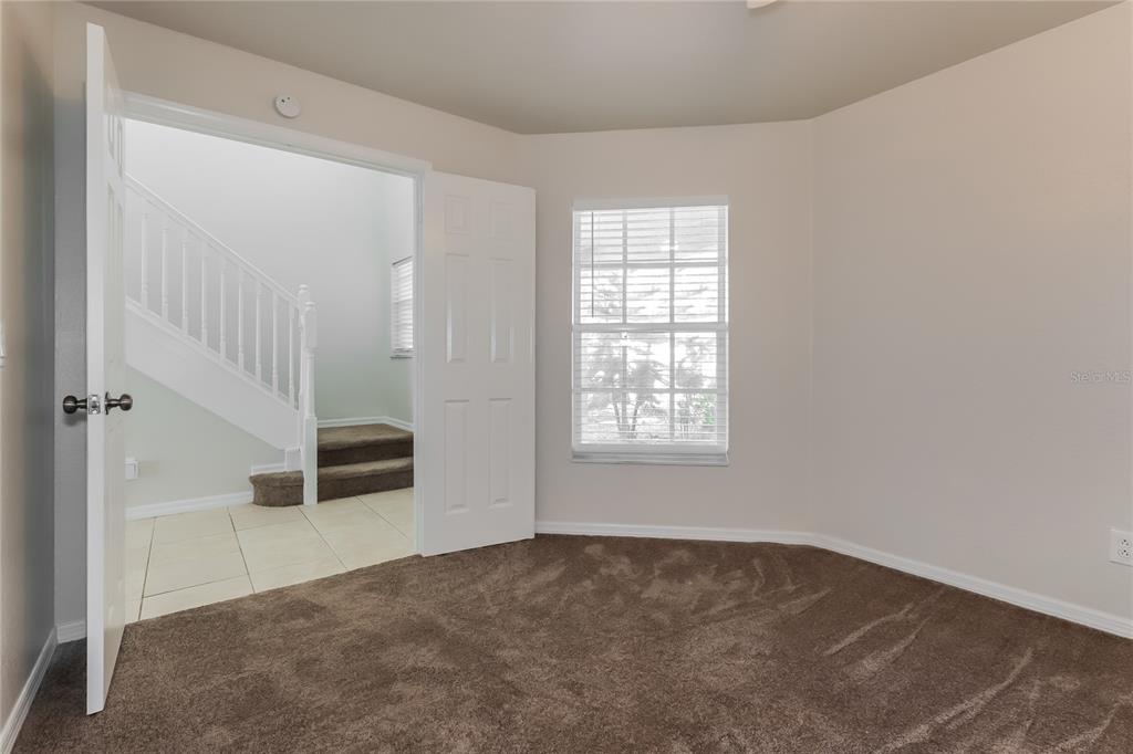 11420 Bay Gardens Loop Riverview, FL 33569 - Photo 10 of 17 an empty room with windows