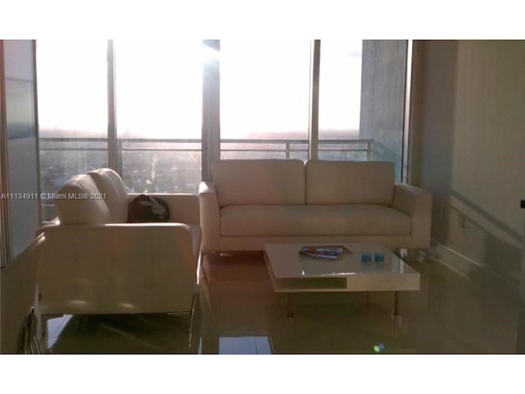 92 Southwest 3rd Street, Unit 3808 Miami, FL 33130 - Photo 9 of 15 a living room with furniture