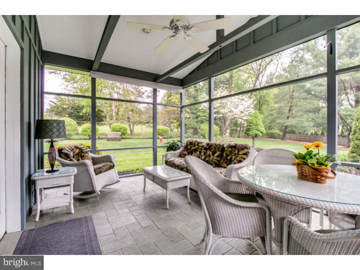 8 Squirrel Run Greenville, DE 19807 - Photo 12 of 24 a living room with large windows