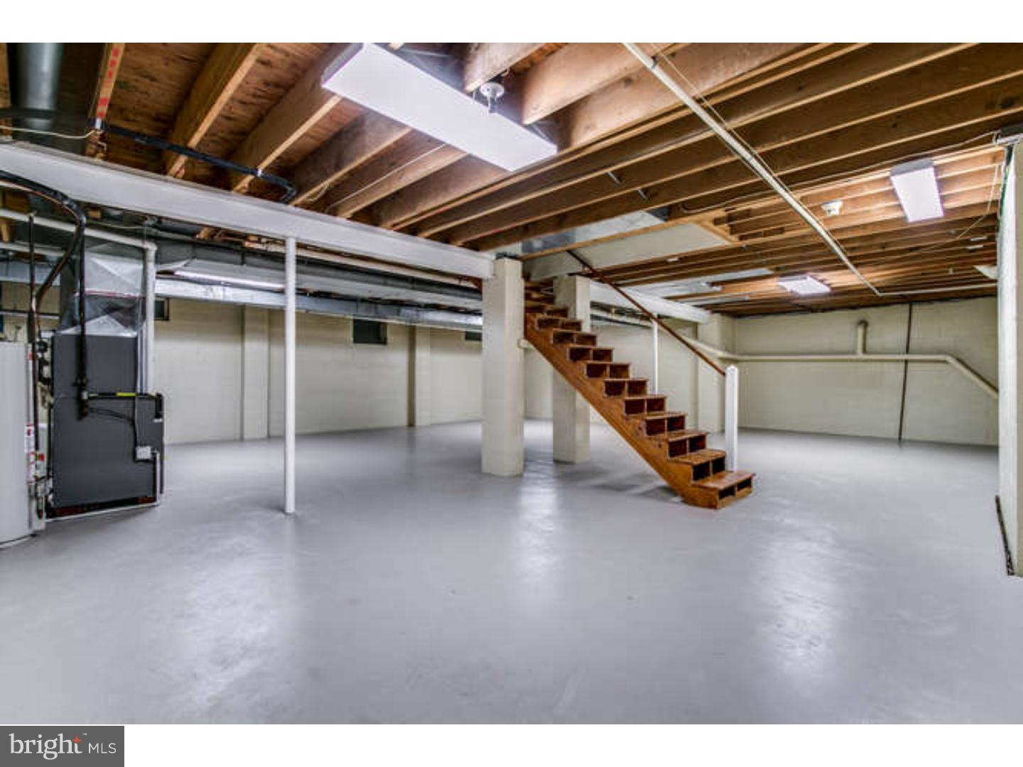 8 Squirrel Run Greenville, DE 19807 - Photo 22 of 24 a view of an empty room with stairs