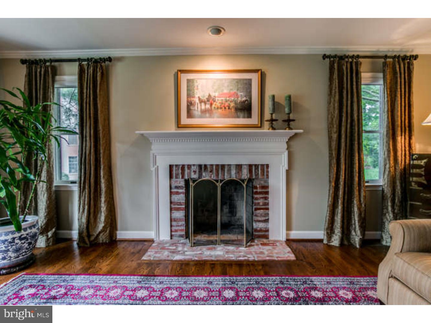 8 Squirrel Run Greenville, DE 19807 - Photo 5 of 24 a living room with furniture and a fireplace