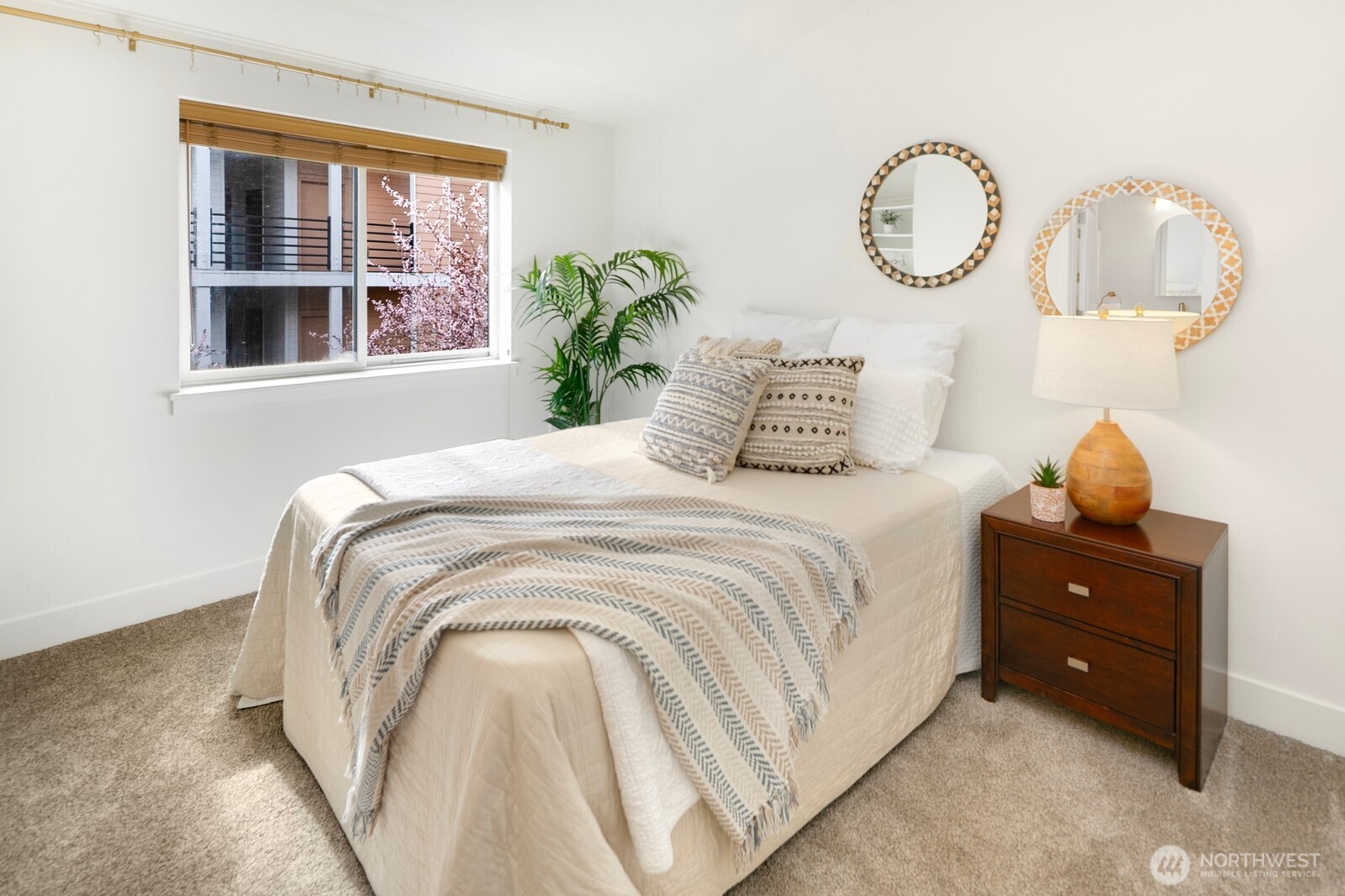 921 North 35th Street, Unit B Seattle, WA 98103 - Photo 12 of 28 a bedroom with a bed and window