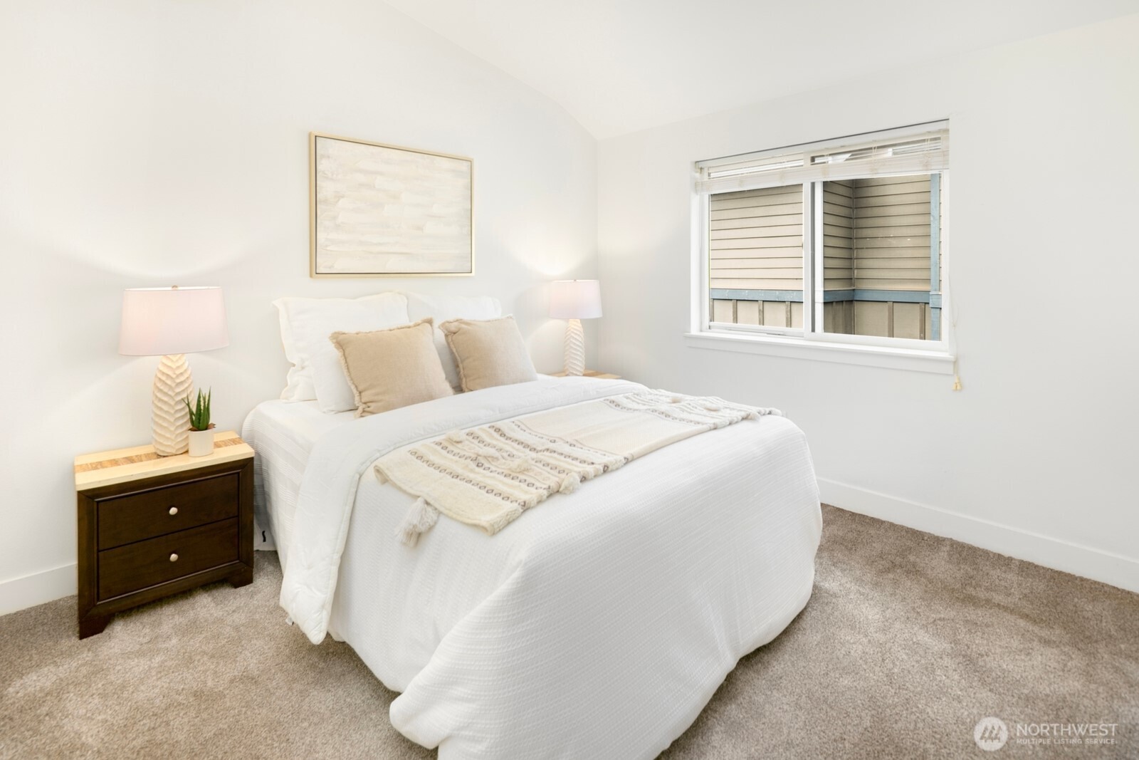 921 North 35th Street, Unit B Seattle, WA 98103 - Photo 14 of 28 a bedroom with a bed and a window